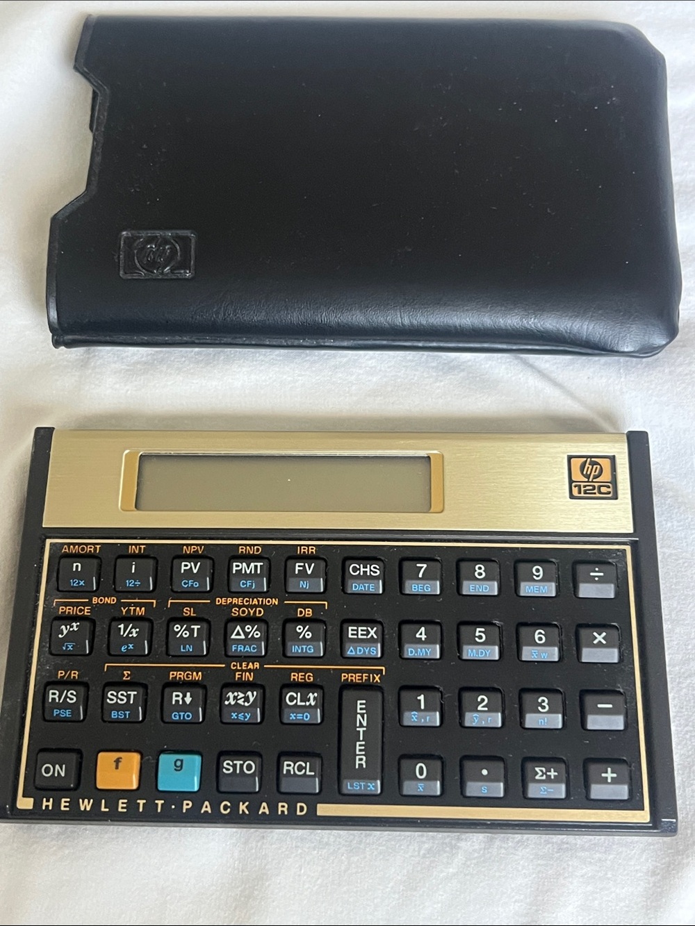 HP 12C Financial Calculator in Black and Gold